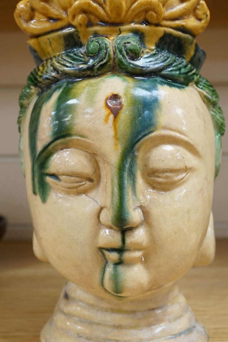 A Chinese Sancai glazed bust of a Bodhisattva, 23cm high